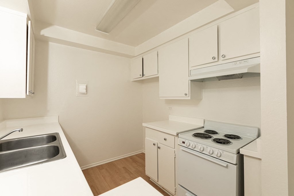 Kitchen with White Appliances and White Cabinets