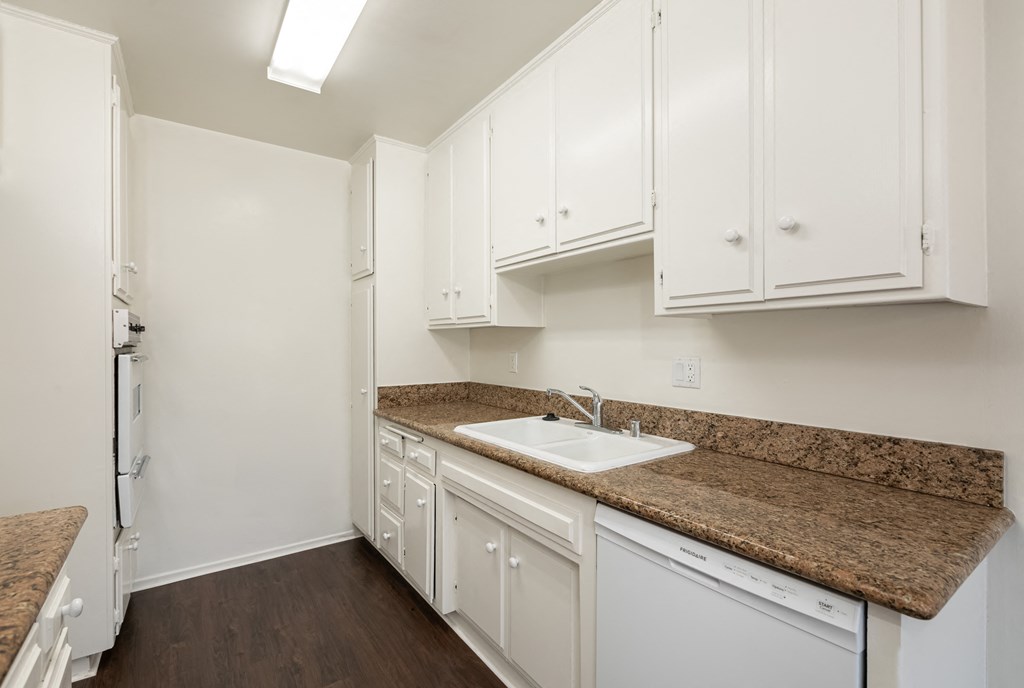 Kitchen with White Appliances and White Cabinets
