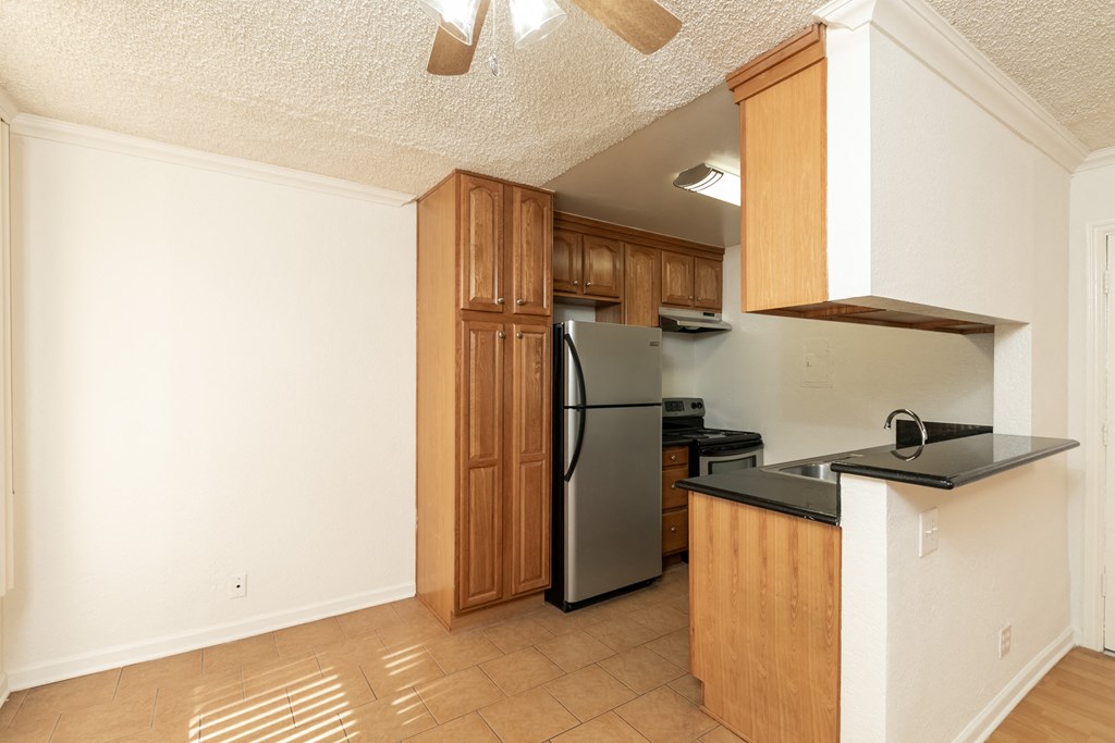 Kitchen with Stainless Steel Appliances and Wood Cabinets
