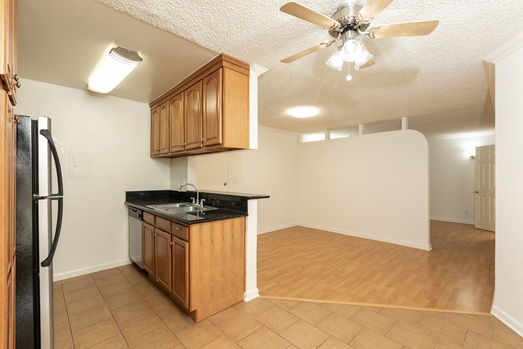 Kitchen with Stainless Steel Appliances and Wood Cabinets