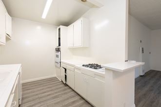 Kitchen with White Appliances and White Cabinets