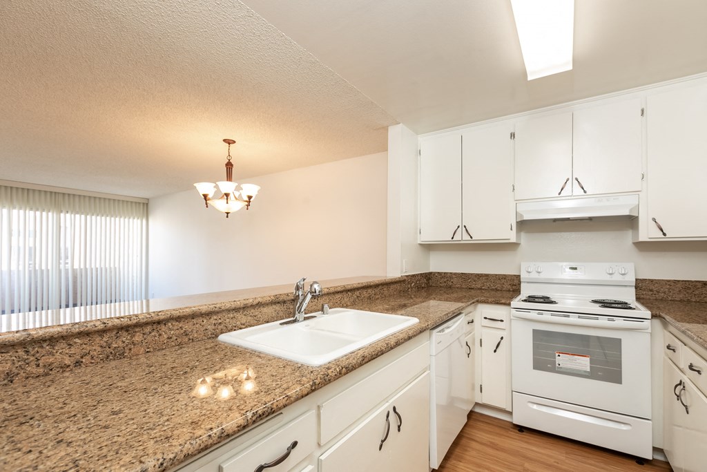 Kitchen with White Appliances and White Cabinets
