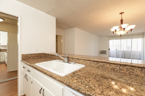 Kitchen with White Appliances and White Cabinets