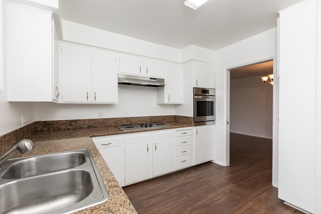 Kitchen with Stainless Steel Appliances and White Cabinets