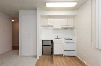 Kitchen with White Appliances and White Cabinets