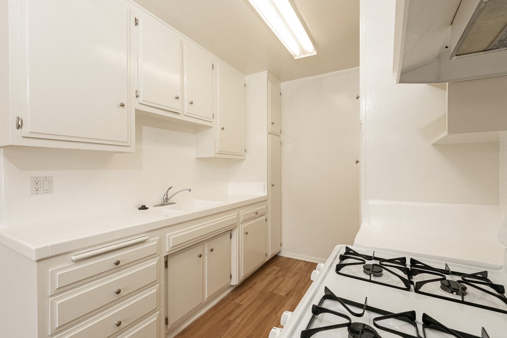 Kitchen with White Appliances and White Cabinets