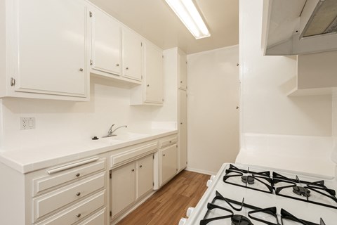 Kitchen with White Appliances and White Cabinets