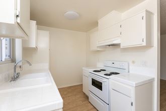 Kitchen with White Appliances and White Cabinets