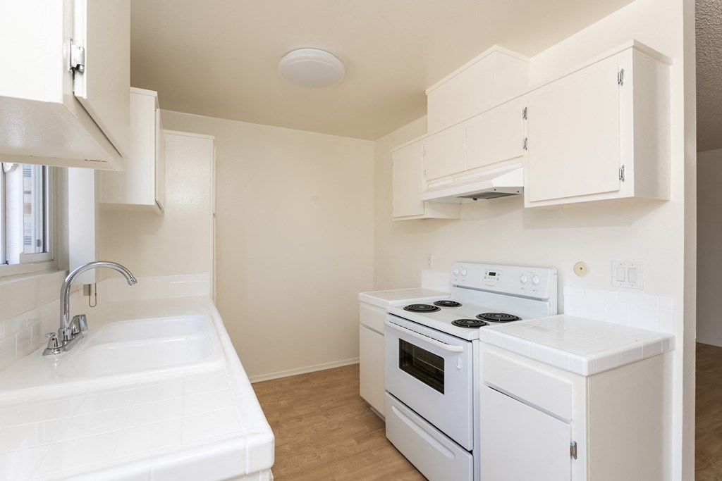 Kitchen with White Appliances and White Cabinets