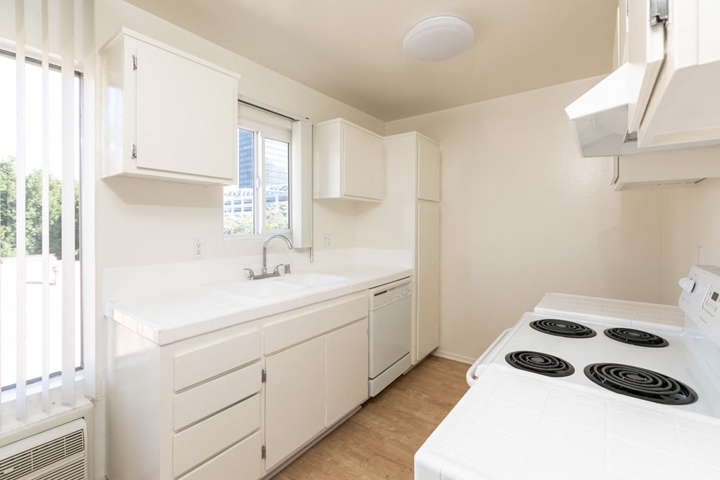 Kitchen with White Appliances and White Cabinets