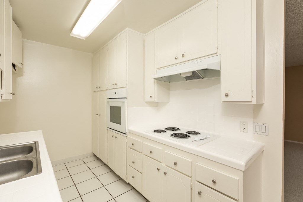 Kitchen with White Appliances and White Cabinets