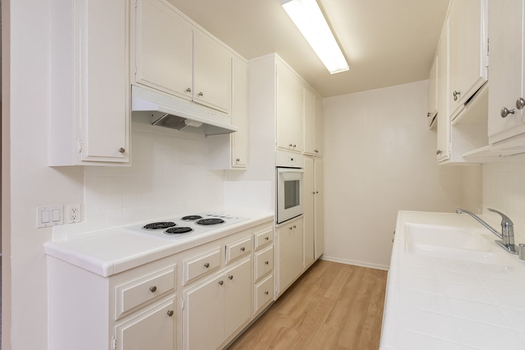 Kitchen with White Appliances and White Cabinets