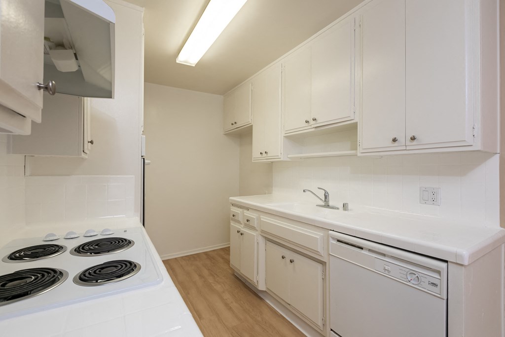 Kitchen with White Appliances and White Cabinets