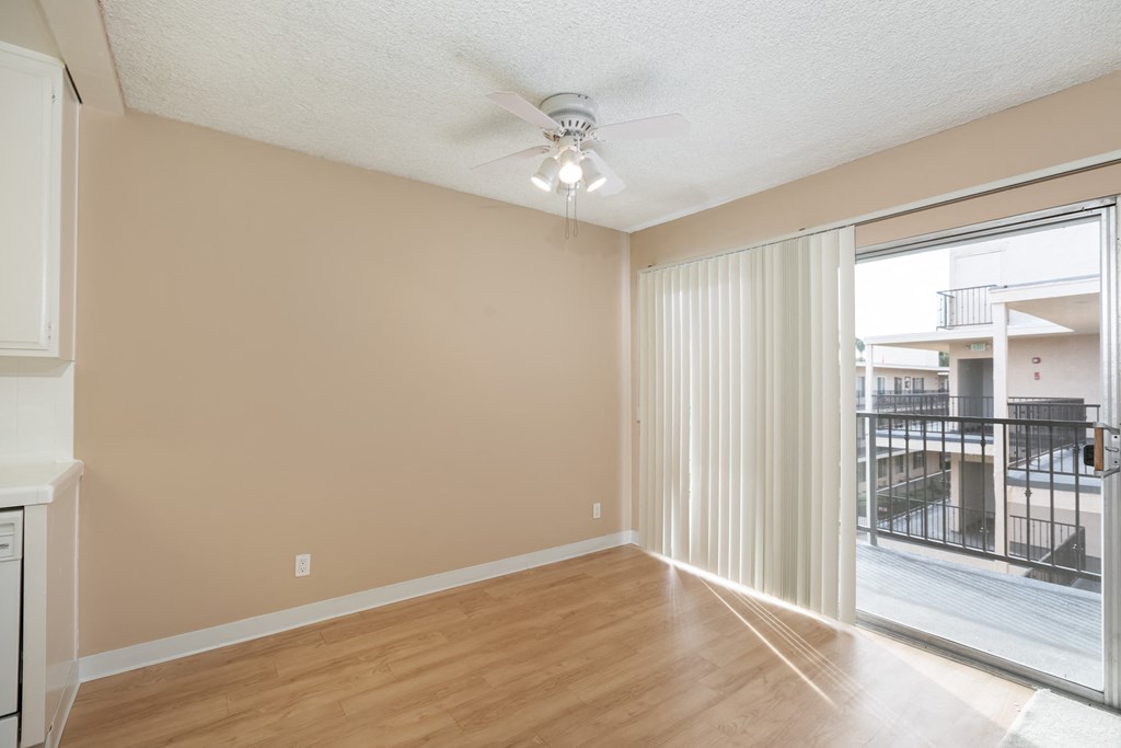 Dining Room with Hardwood Floors and Fan
