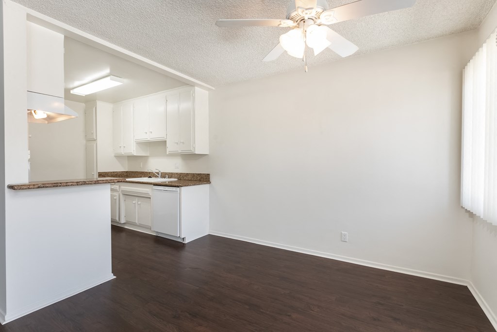 Dining Room with Hardwood Floors and Fan