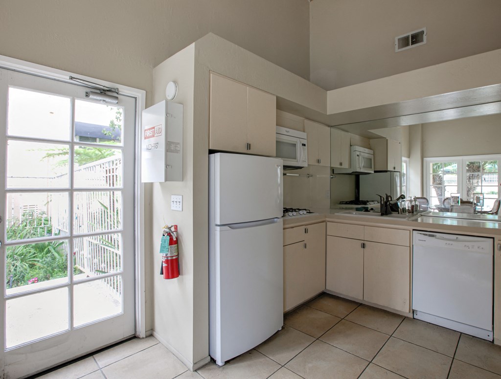 Kitchen with White Appliances and White Cabinets