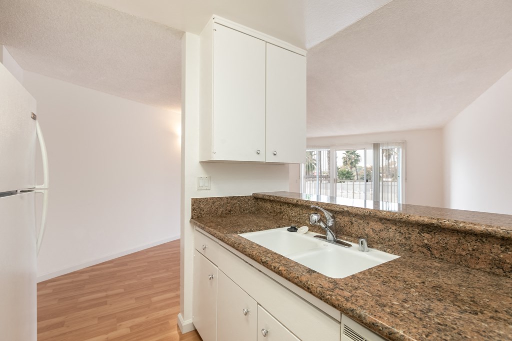 Kitchen with White Appliances and White Cabinets