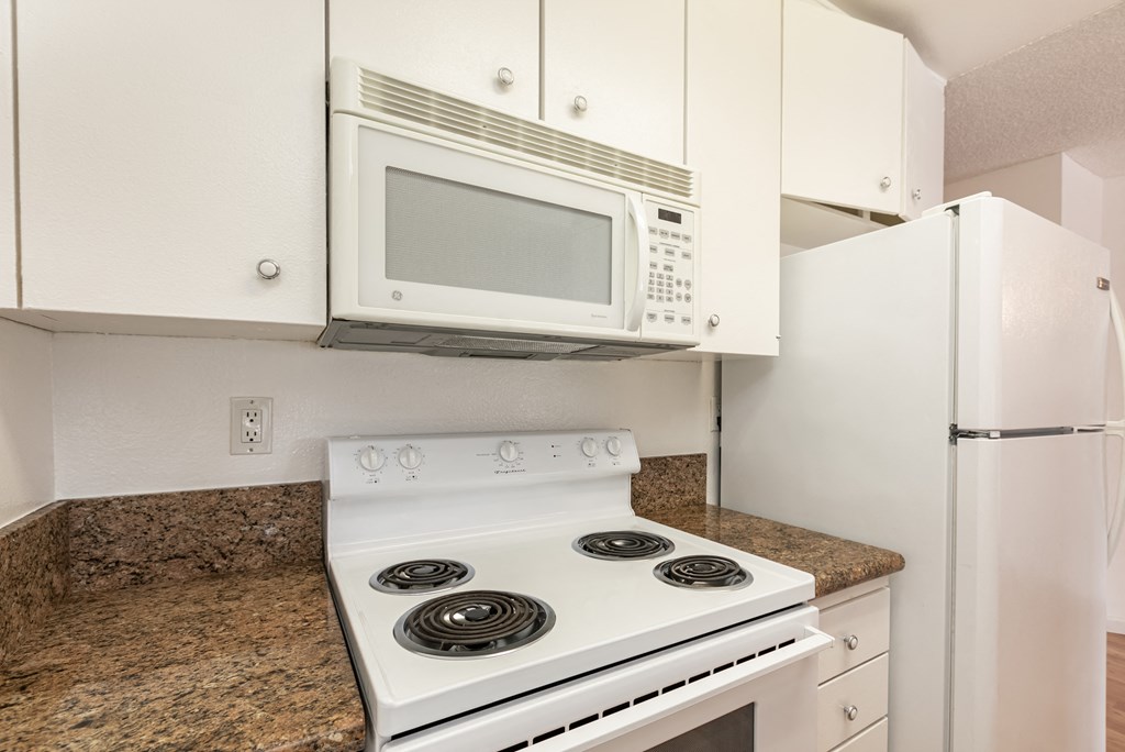 Kitchen with White Appliances and White Cabinets