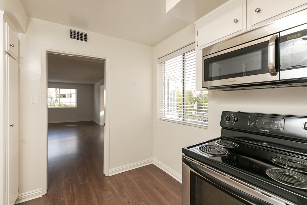 Kitchen with Stainless Steel Appliances and White Cabinets