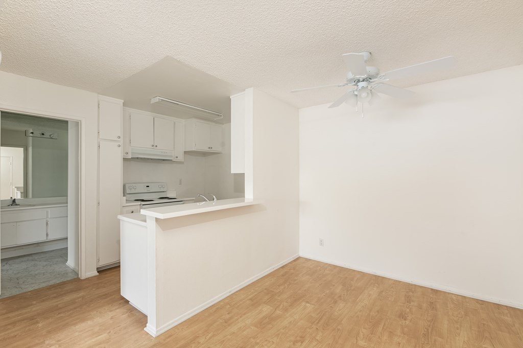 Dining Room with Hardwood Floors and Fan