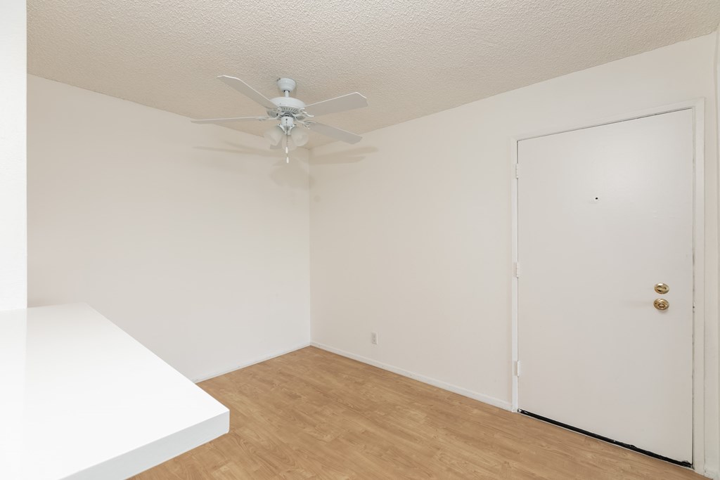 Dining Room with Hardwood Floors and Fan