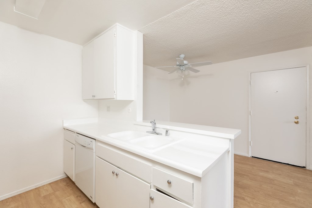 Kitchen with White Appliances and White Cabinets