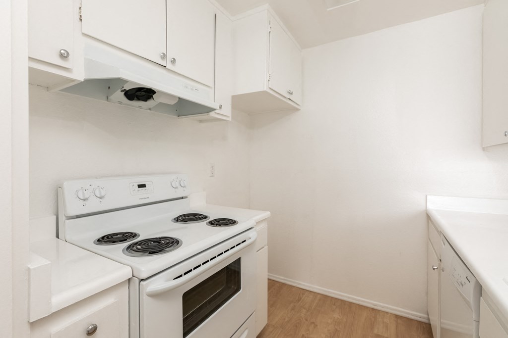 Kitchen with White Appliances and White Cabinets