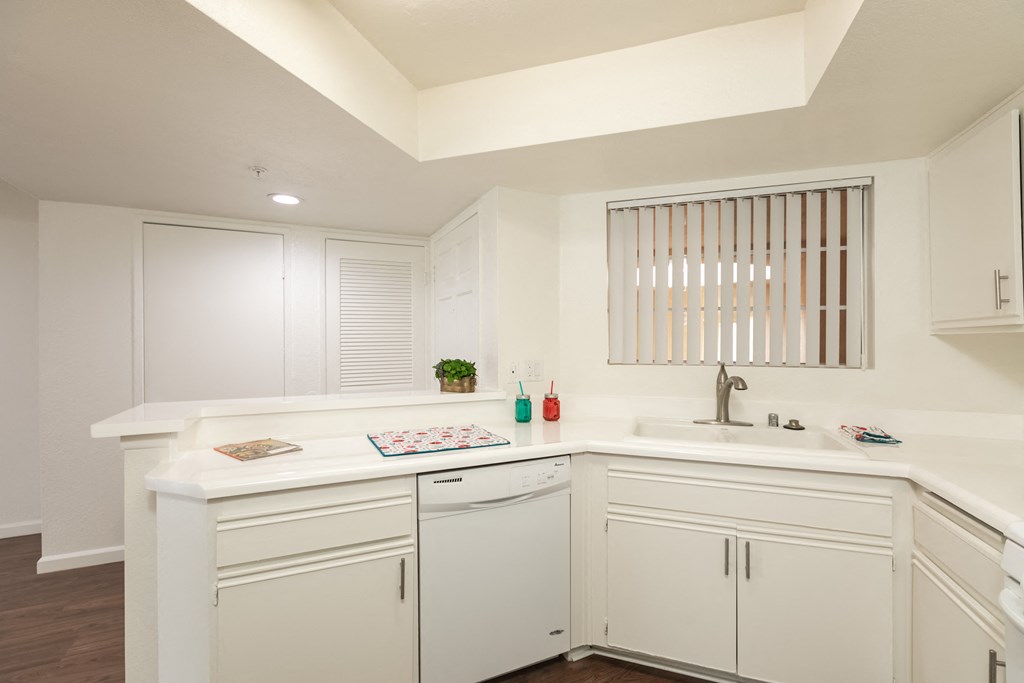 Kitchen with White Appliances and White Cabinets