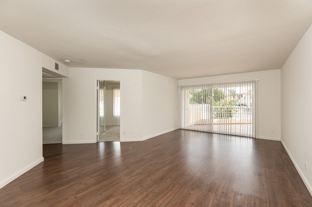 Living Room with Hardwood Floors and Patio Doors