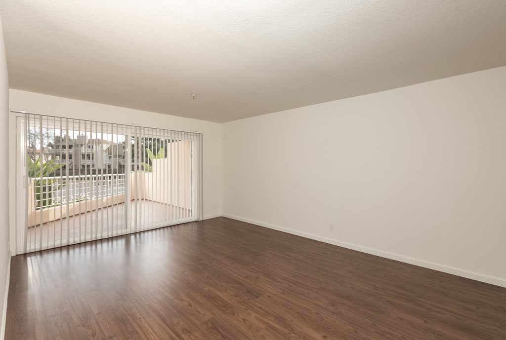 Living Room with Hardwood Floors and Patio Doors