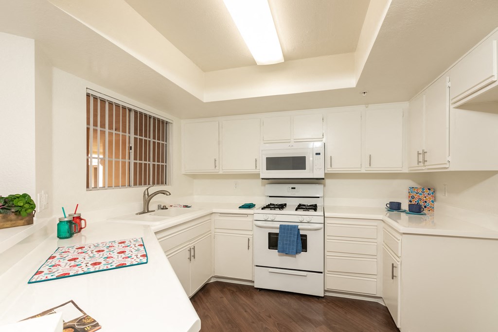 Kitchen with White Appliances and White Cabinets
