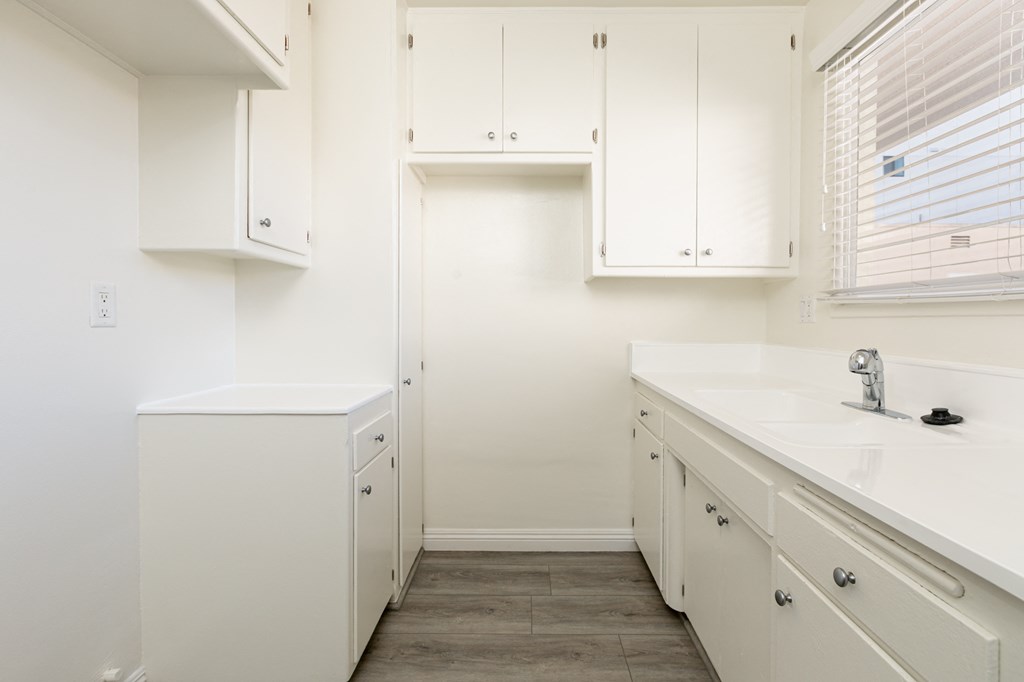Kitchen with White Appliances and White Cabinets