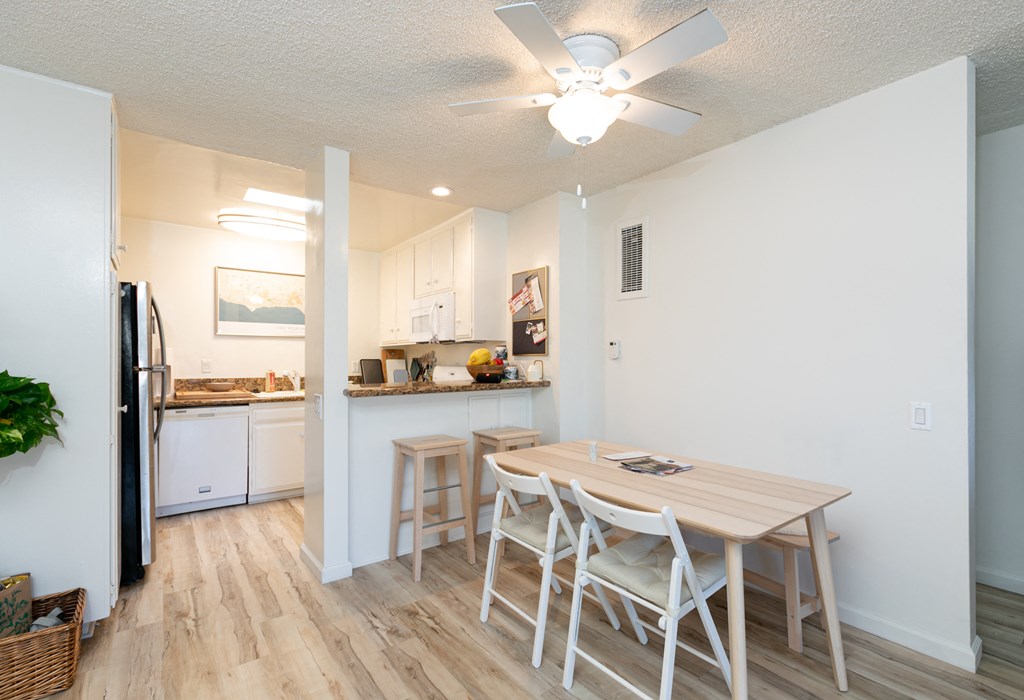 Dining Room with Hardwood Floors and Fan