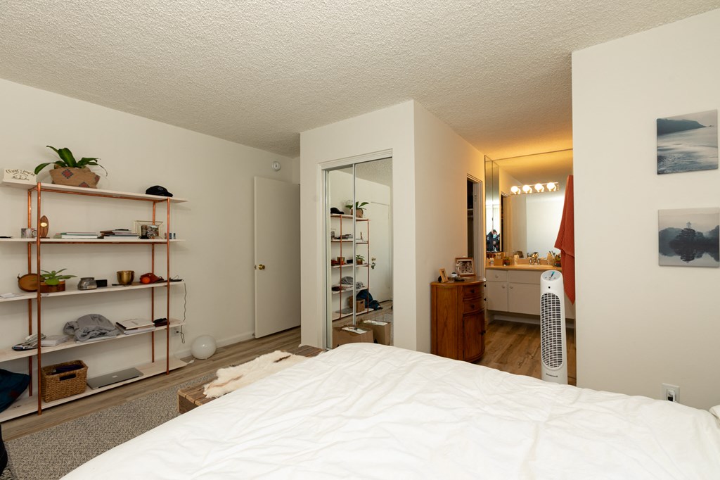 Bedroom with Hardwood Floors and En Suite