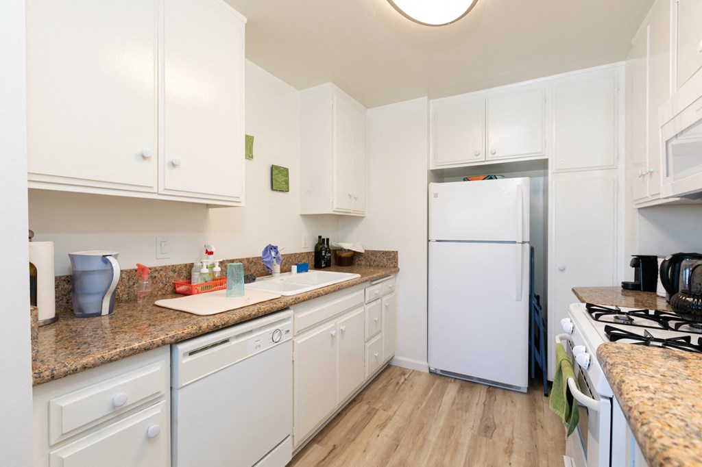 Kitchen with White Appliances and White Cabinets