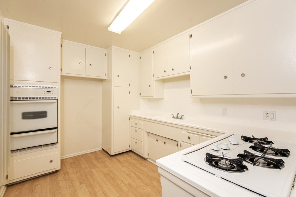 Kitchen with White Appliances and White Cabinets