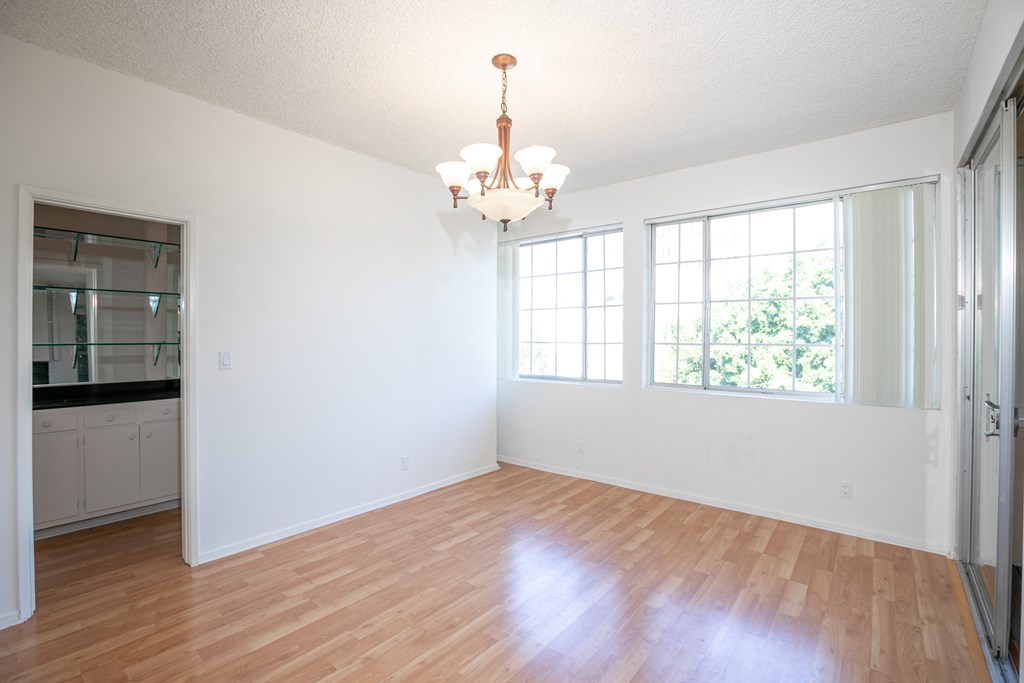 Dining Room with Hardwood Floors and Chandelier