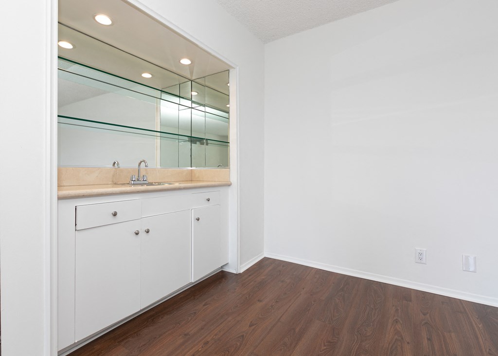 Wet Bar with Hardwood Floors
