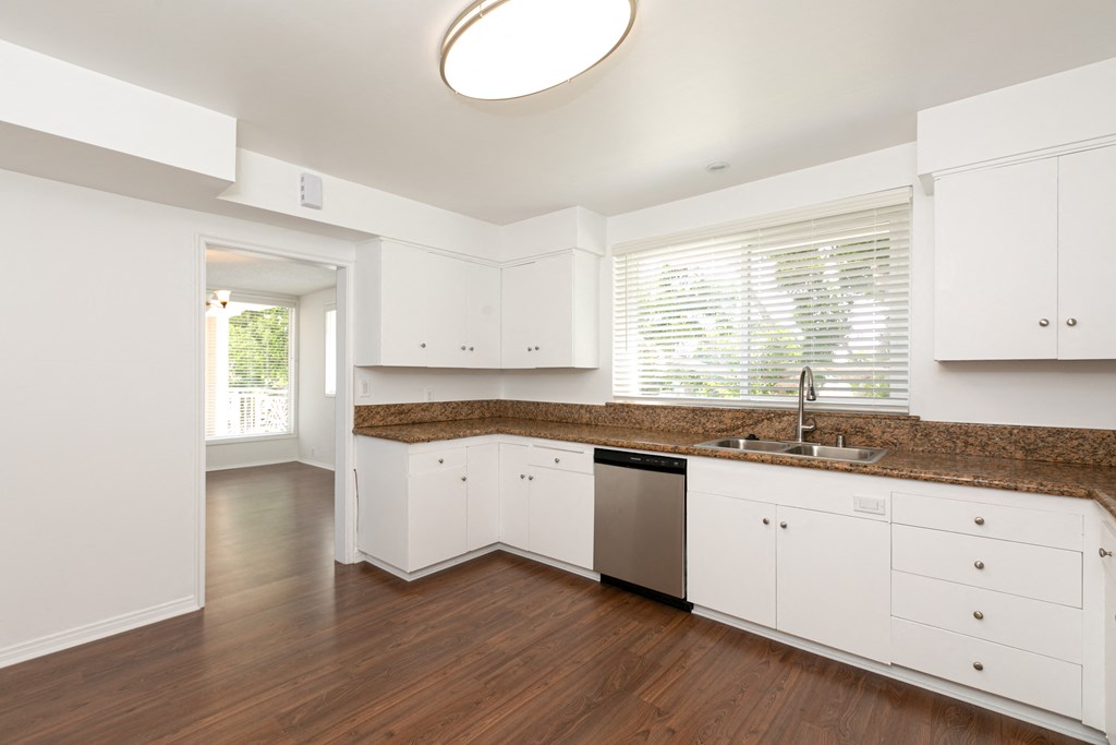 Kitchen with Stainless Steel Appliances and White Cabinets