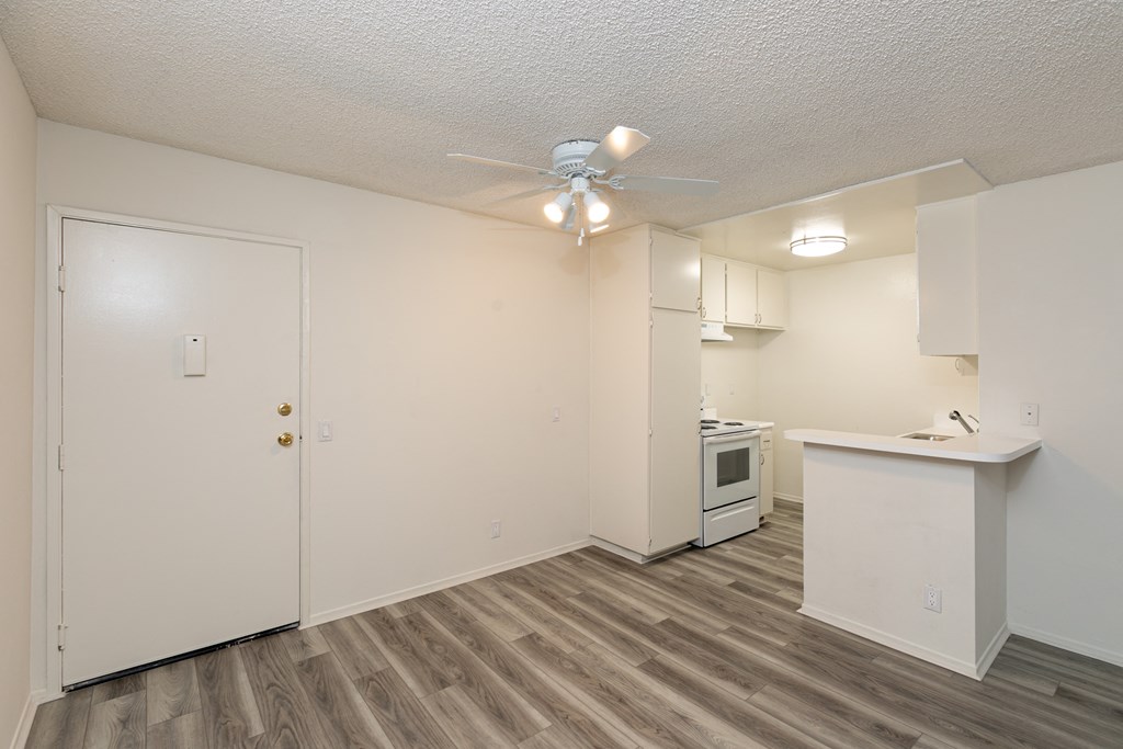 Dining Room with Hardwood Floors and Fan