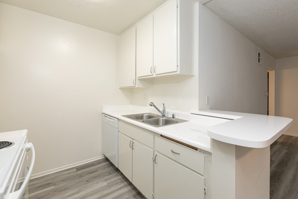 Kitchen with White Appliances and White Cabinets