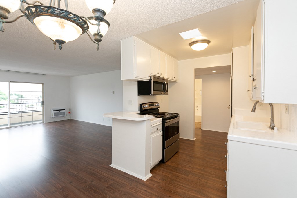 Kitchen with Stainless Steel Appliances and White Cabinets