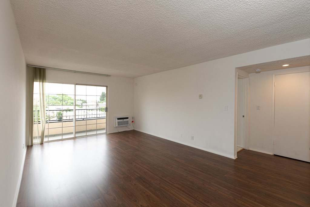 Living Room with Hardwood Floors and Patio Doors