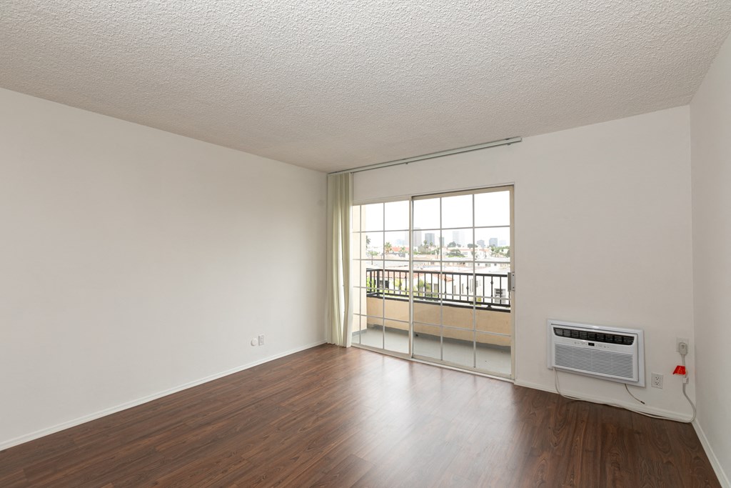 Living Room with Hardwood Floors and Patio Doors