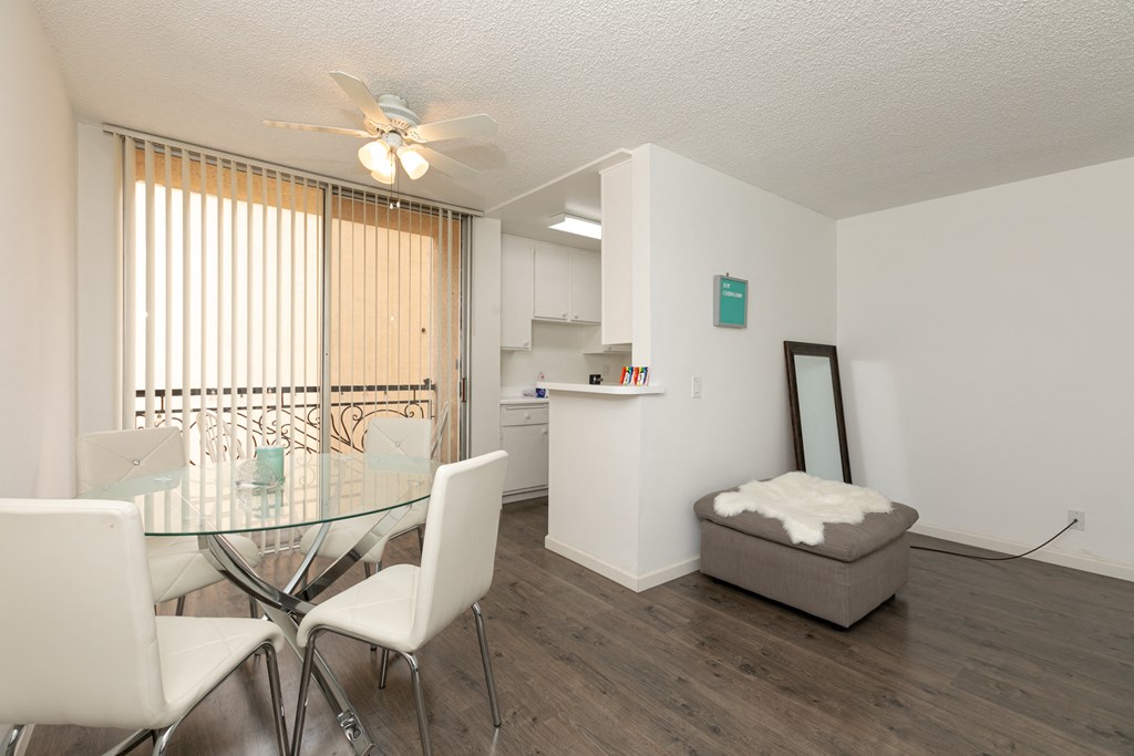 Dining Room with Hardwood Floors and Fan