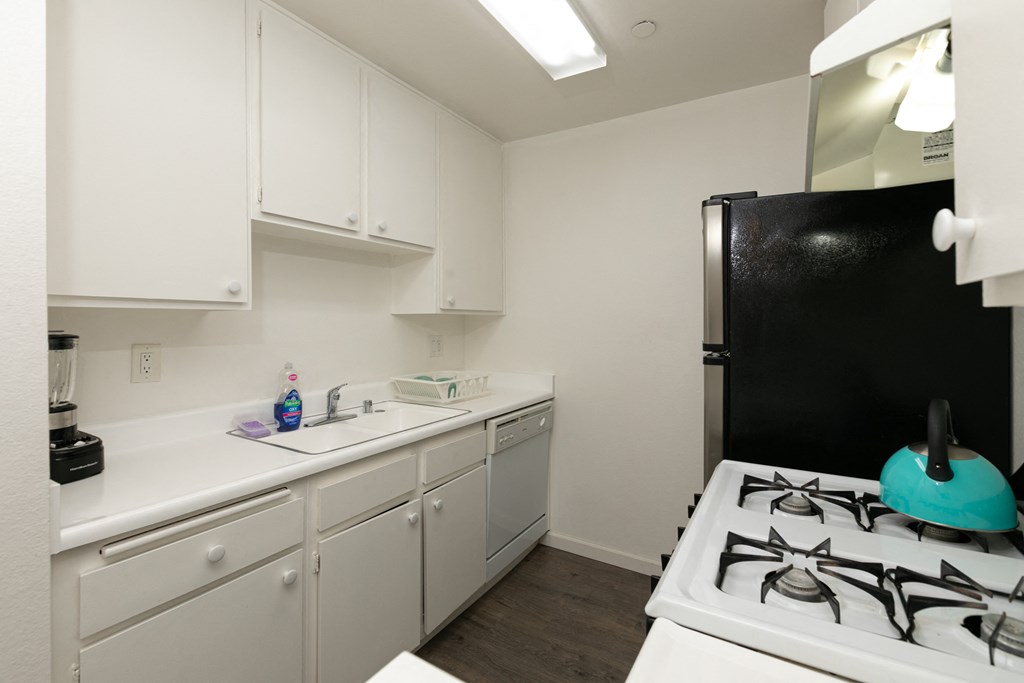 Kitchen with White Appliances and White Cabinets