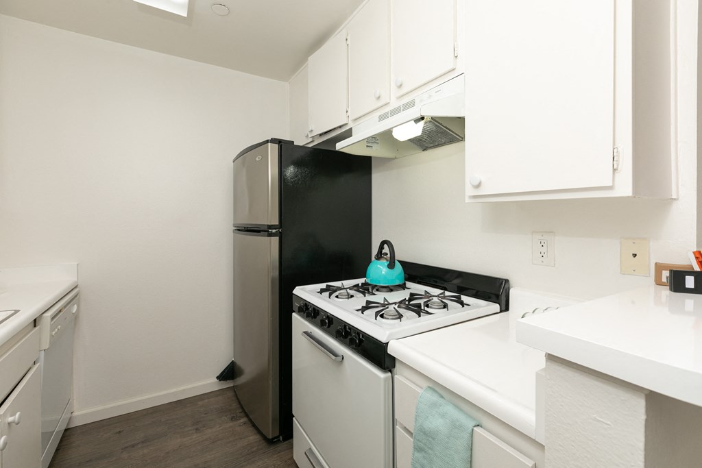 Kitchen with White Appliances and White Cabinets