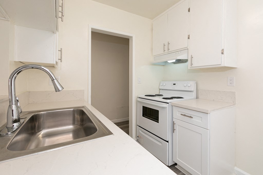 Kitchen with White Appliances and White Cabinets