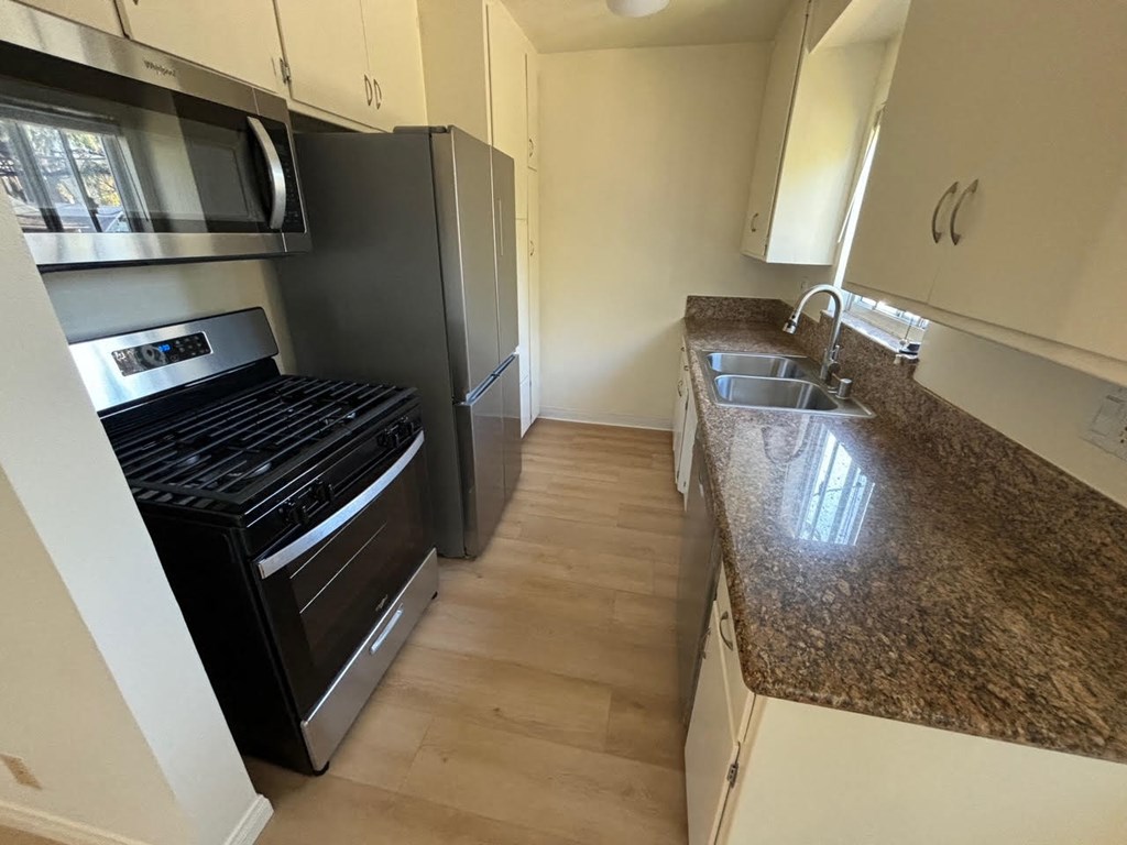 Kitchen with Granite Countertop and Hardwood Floors