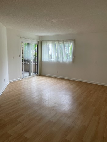 Living Room with Hardwood Floors and Patio Doors - Photo Gallery 6